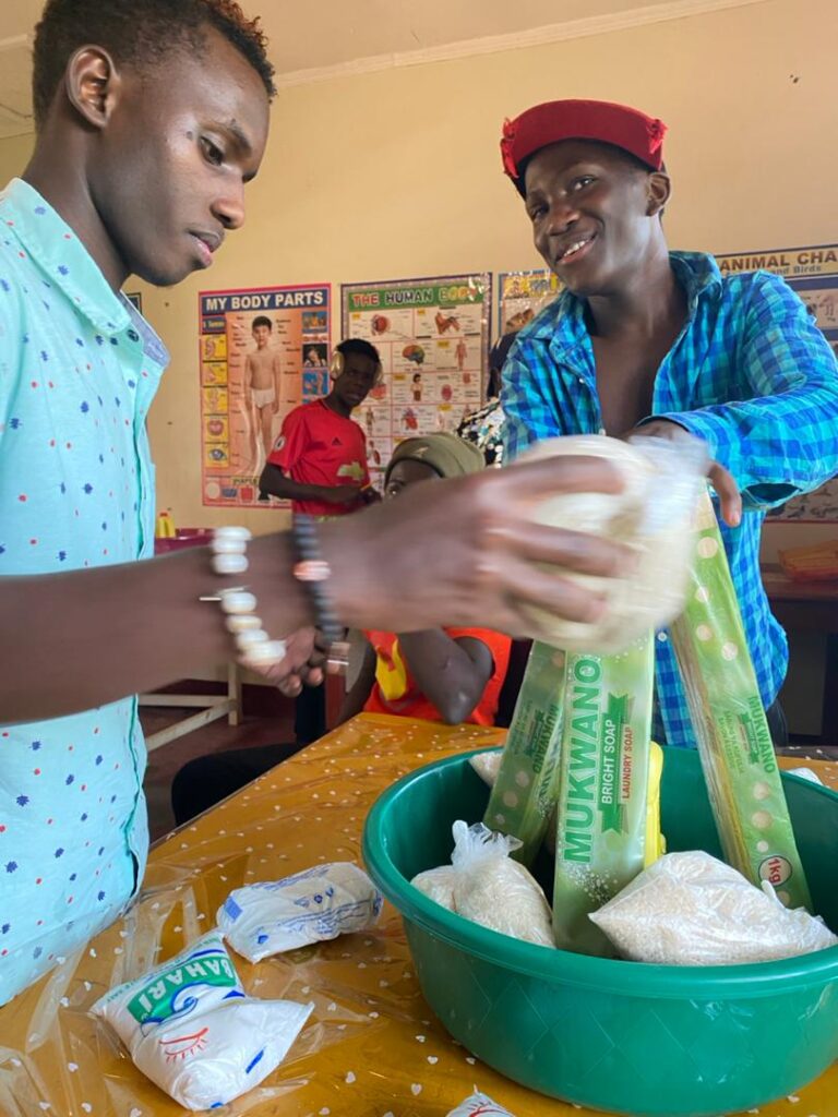 Omacan youth pack essentials into a gift basin